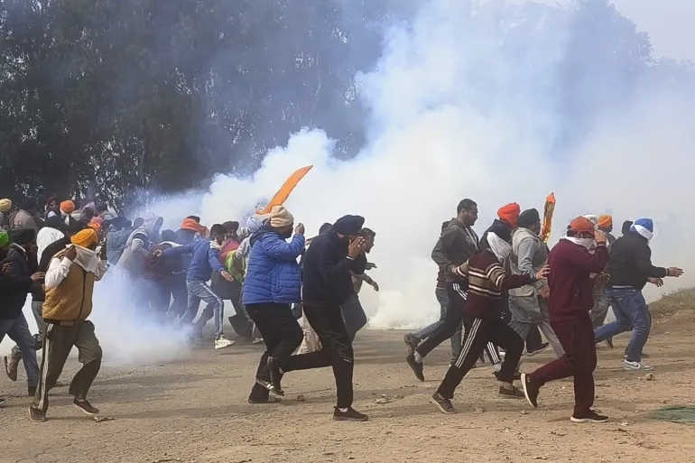 Protesting Farmers Face Tear Gas from Indian Police on Route to Capital