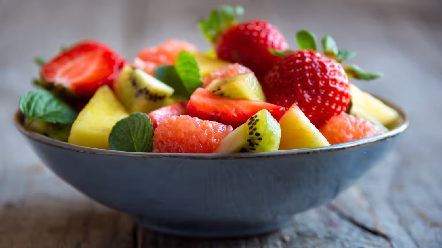 What fruits are essential for preserving wellness in hot weather?