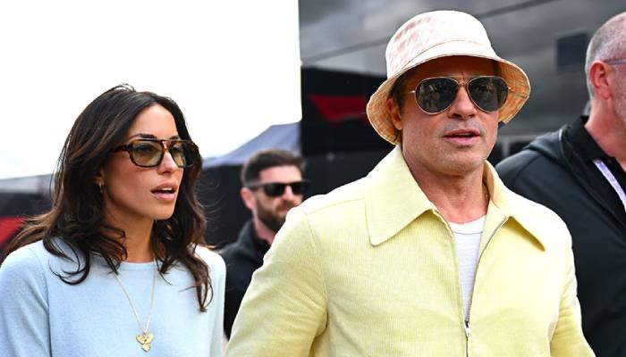 Brad Pitt Makes Public Appearance with Girlfriend at British Grand Prix