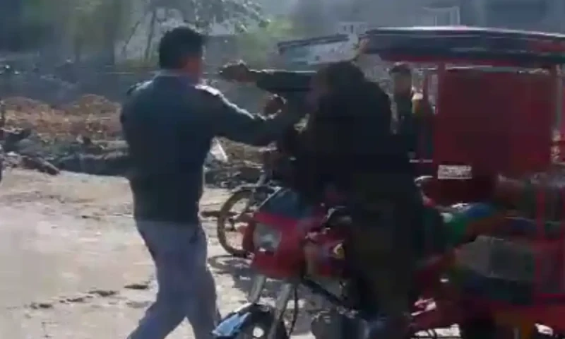 Traffic Warden Caught on Video Assaulting Disabled Rickshaw Driver in Lahore