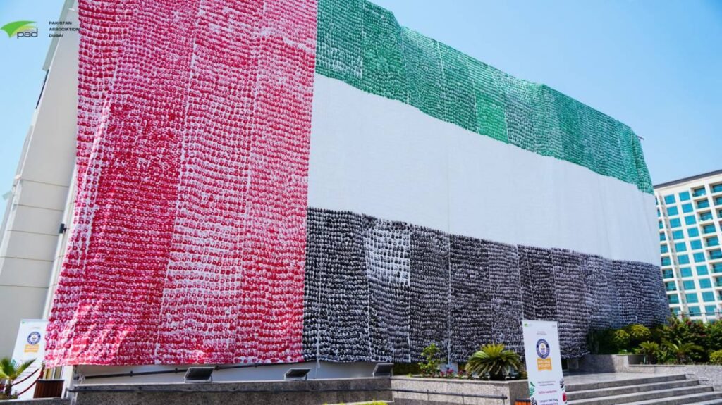 Pakistani Community Sets Guinness World Record with Largest UAE Handprinted Flag in Dubai