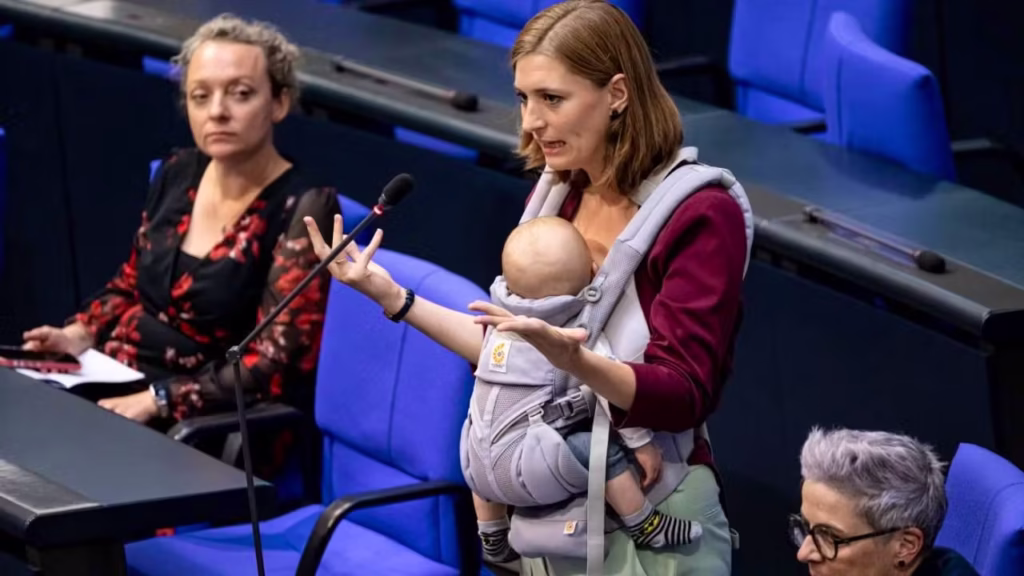 History Made as German MP Gives Budget Speech Holding Baby