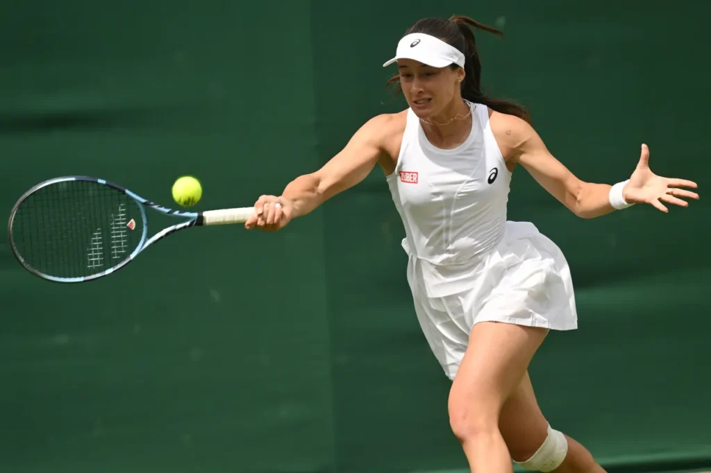 Zeynep Sonmez Stages Comeback to Reach Wimbledon 2026 Second Round Zeynep Sonmez Stages Comeback to Reach Wimbledon 2026 Second Round Turkish tennis player Zeynep Sonmez advanced to the second round of Wimbledon 2026 after defeating American Ann Li in a thrilling three-set match on Monday. Sonmez recovered from a difficult start to secure a 7-5, 1-6, 6-4 victory in the opening round of the grass-court Grand Slam in London. The world No. 51 faced a tough challenge against Li, who entered the tournament ranked No. 29. However, Sonmez showed determination throughout the contest. Li dominated the opening stages and quickly established a commanding 4-1 advantage in the first set. Nevertheless, Sonmez responded with aggressive returning and broke serve twice. She moved ahead 5-4 and created two set points. Although Li briefly fought back with a break, Sonmez regained momentum immediately afterward. She captured the final two games and claimed the opening set 7-5 after maintaining consistent pressure from the baseline. Li answered strongly in the second set and controlled nearly every exchange. Consequently, she raced into a 3-0 lead before comfortably winning the set 6-1. The deciding set remained highly competitive as both players held serve through the opening eight games. Therefore, the score reached 4-4 with neither player creating separation. Sonmez then produced the decisive break of serve and confidently served out the match to seal a memorable comeback victory. The Turkish star will now face either American Claire Liu or Belgium's Hanne Vandewinkel in the second round of Wimbledon. Moreover, the victory improved Sonmez's perfect record against Li to three wins from three career meetings. She previously defeated the American at the Merida Open. Last year, Sonmez made Turkish tennis history by becoming the first player from Tรผrkiye to reach the third round at Wimbledon. Furthermore, she became the country's first Grand Slam third-round participant since 1950, underlining her rapid rise on the international tennis stage.