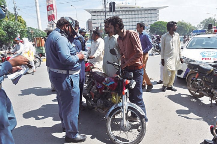 Lahore Bans Helmetless Riders From Major City Roads Lahore Bans Helmetless Riders From Major City Roads