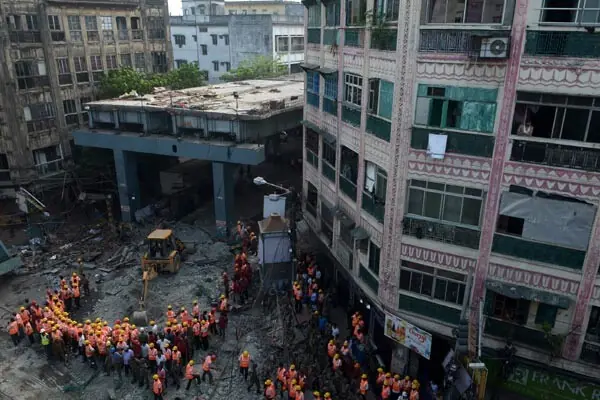 Heavy monsoon rains kill several across India as building collapses and landslides hit cities