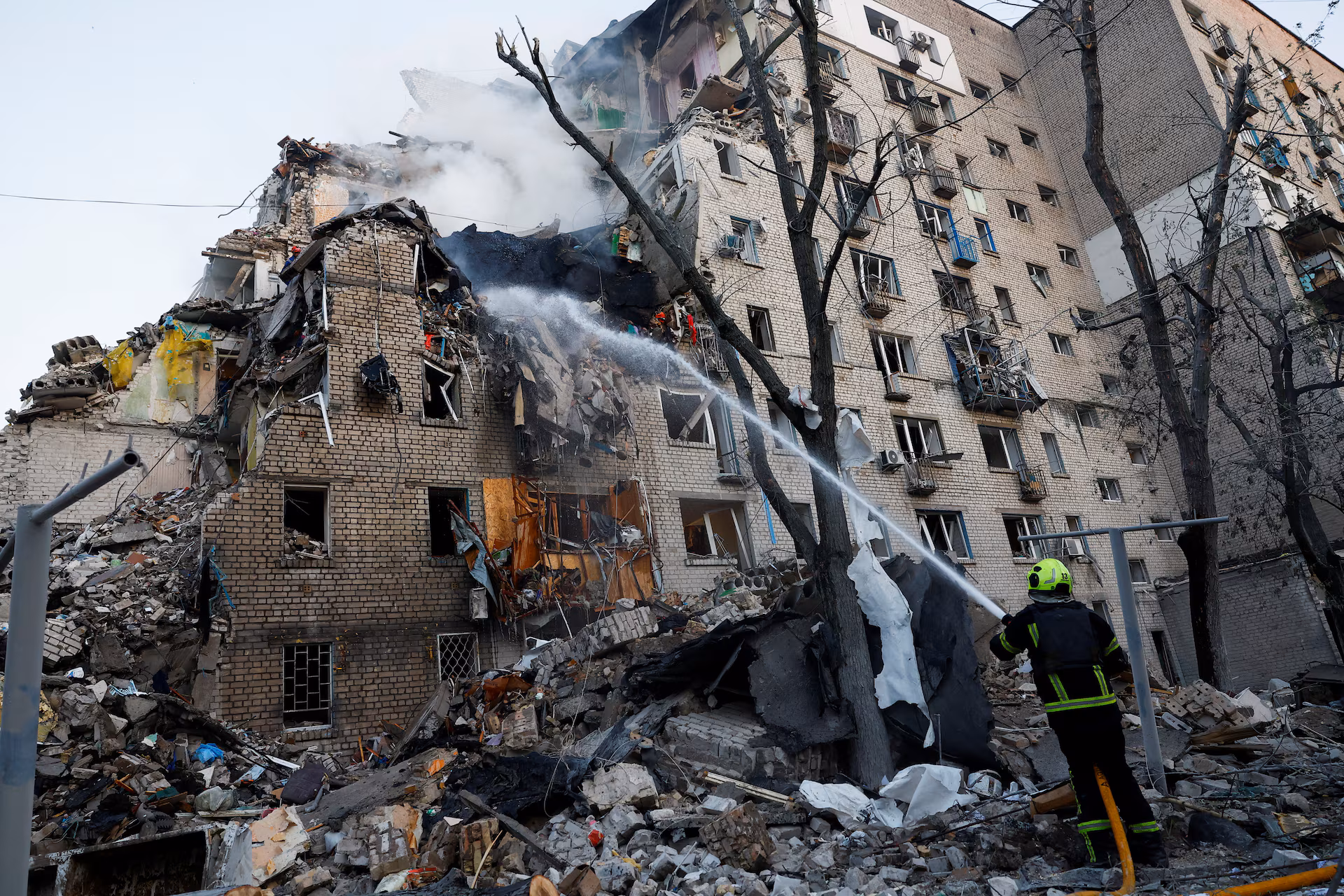 Russian strikes kill 10 in Kyiv as Ukraine urges stronger air defence support