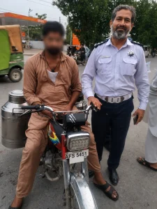 Lahore Milkman Faces Rs100,000 Penalty After 50 Unpaid Helmet Challans
